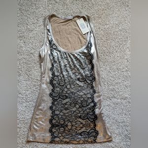 Jaquette BRAND NEW never worn XS gold tank with black lace design.